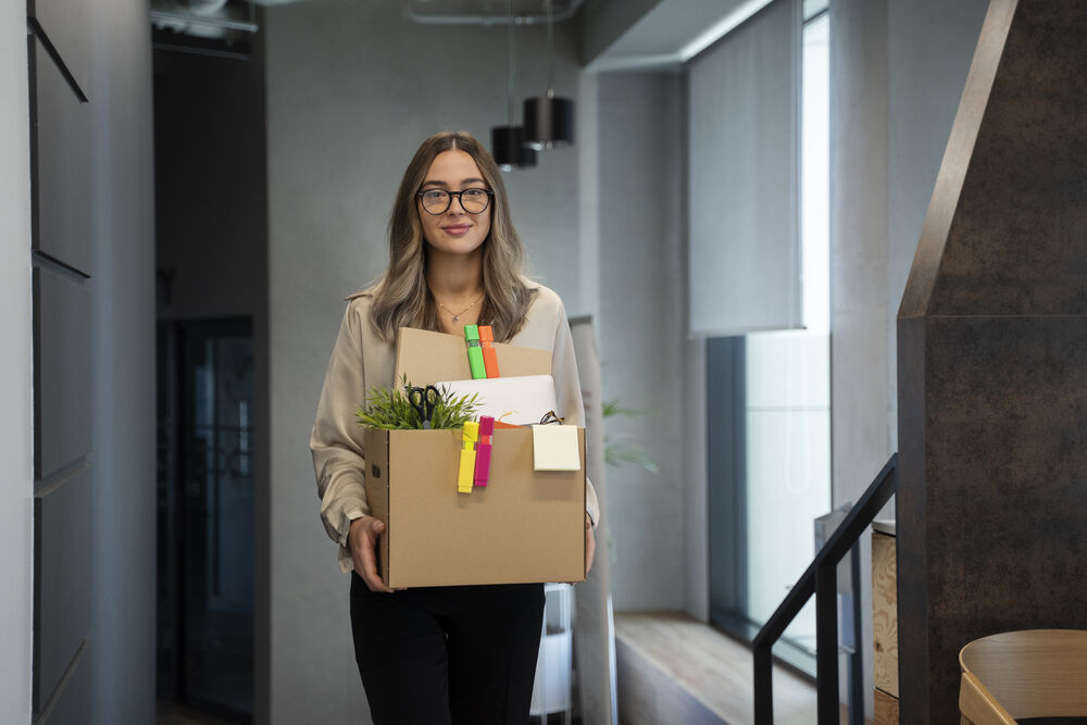 medium-shot-woman-carrying-cardboard-box