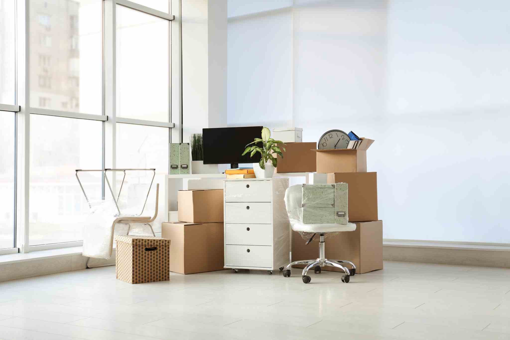 Office moving with boxes
